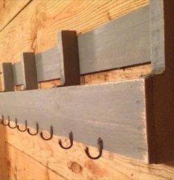 reclaimed pallet shelf with metal hooks