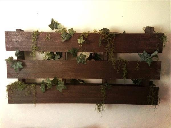 recycled pallet headboard and wall art