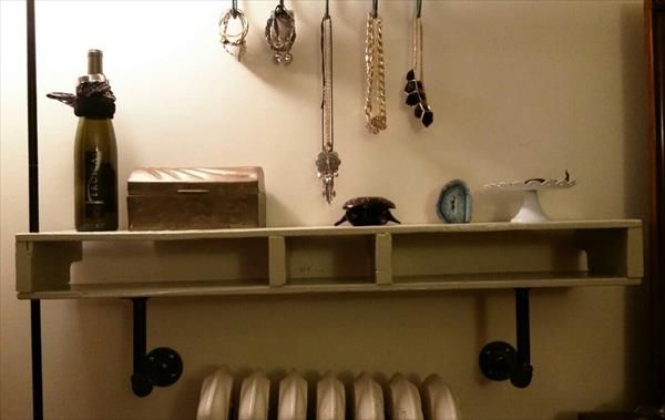 handmade pallet and iron pipe shelf
