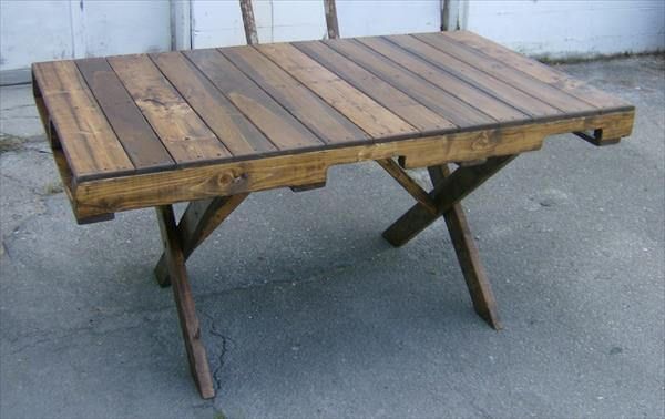 recycled pallet dining table with criss cross legs
