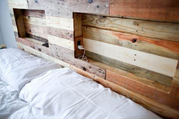 reclaimed pallet headboard with mobile phone charging outlets