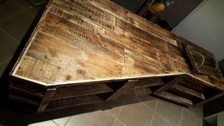 upcycled wooden pallet corner TV stand