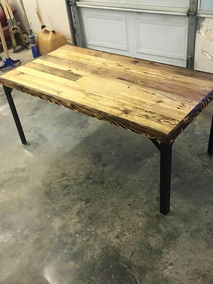 repurposed wooden pallet and metal coffee table