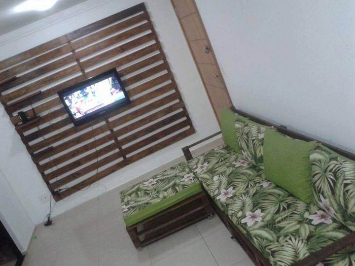 wooden pallet media wall and sofa