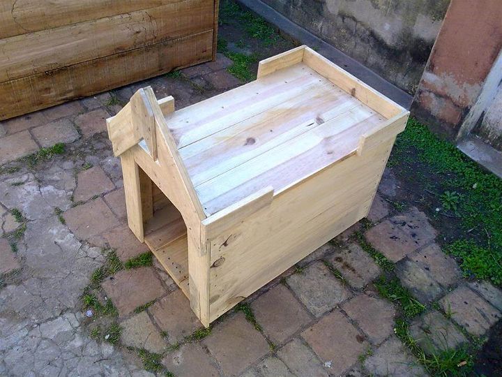 handcrafted pallet doghouse